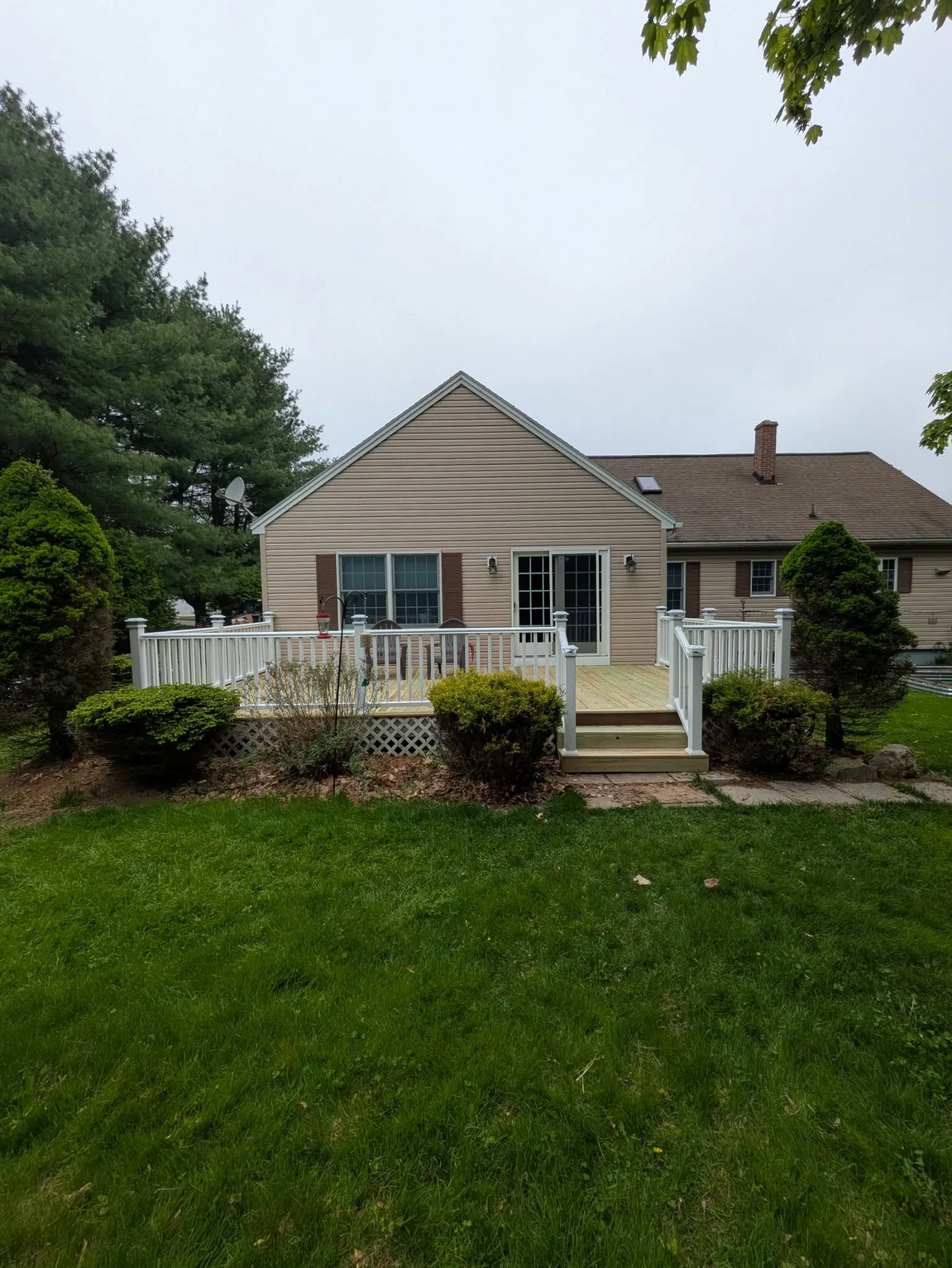 Custom deck by Stronghold Deck Company · Central Maine