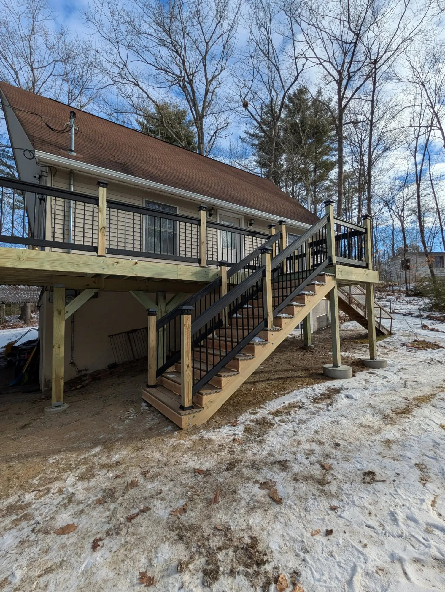 Custom deck by Stronghold Deck Company · Central Maine