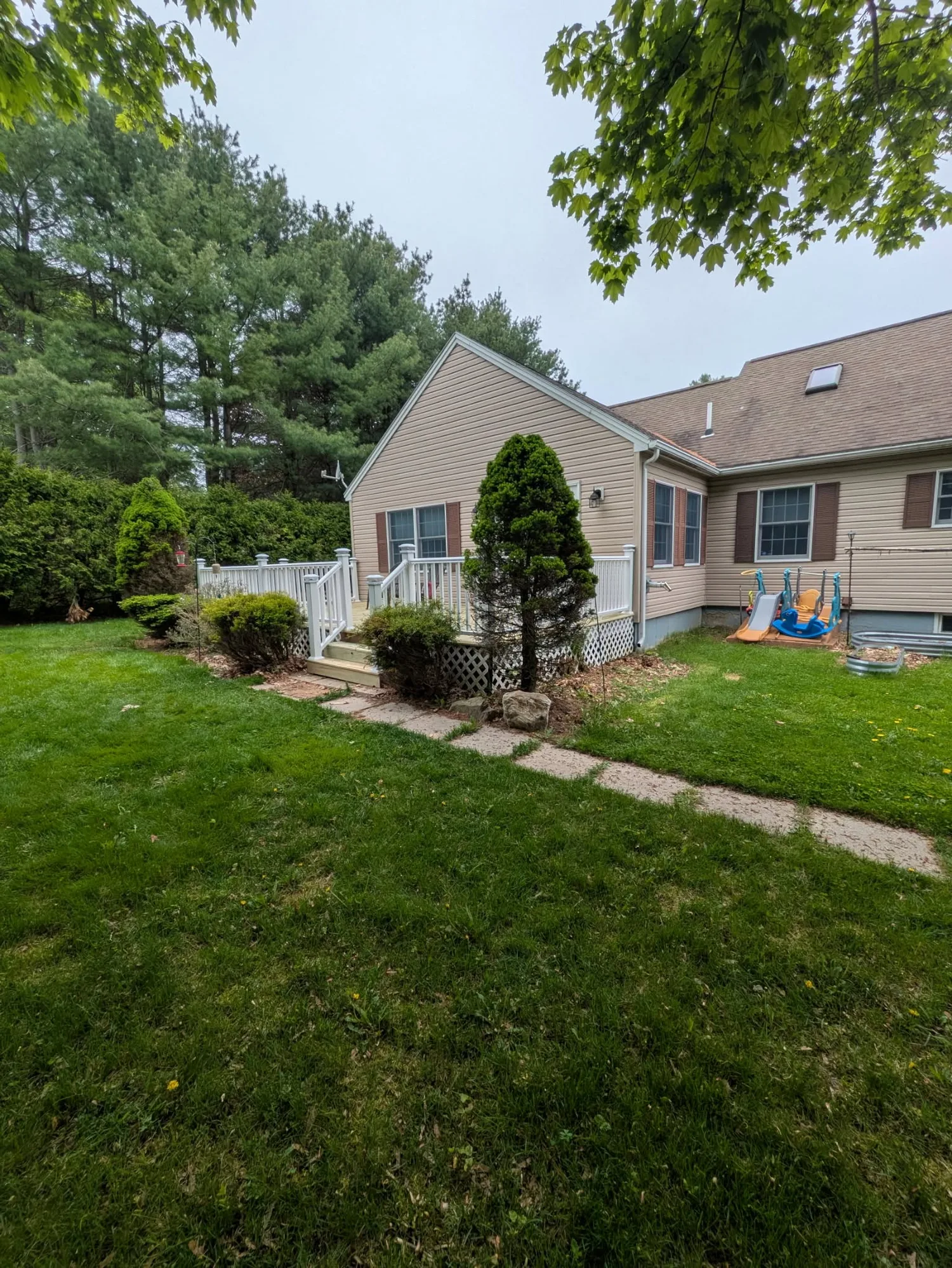 Custom deck by Stronghold Deck Company · Central Maine